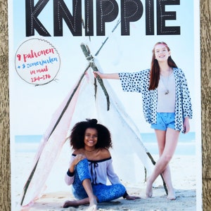 May include: A magazine cover for Knippie, a Dutch sewing magazine, featuring two girls on a beach. The cover text reads "9 patronen + 3 zomerjurken in maat 134-176".