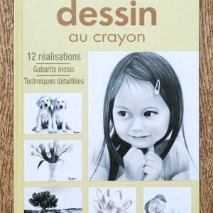 May include: A book titled "Les bases du dessin au crayon" with illustrations of a girl, puppies, flowers, a tree, a lotus flower, and a chick. The cover is light yellow with text in brown and black.