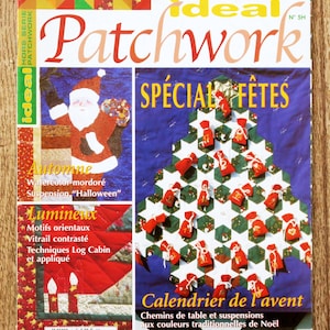 May include: A magazine titled Ideal Patchwork No 5H featuring a cover with a Santa Claus illustration, a Christmas tree-shaped advent calendar with red numbered pouches, and text including Spécial Fêtes and Calendrier de l'avent.