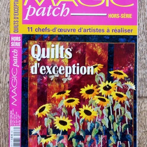 Op de afbeelding: Een tijdschriftcover met een kleurrijke quilt met een zonnebloemdessin. De titel van het tijdschrift is "Magic Patch" en de ondertitel is "Quilts d'exception".