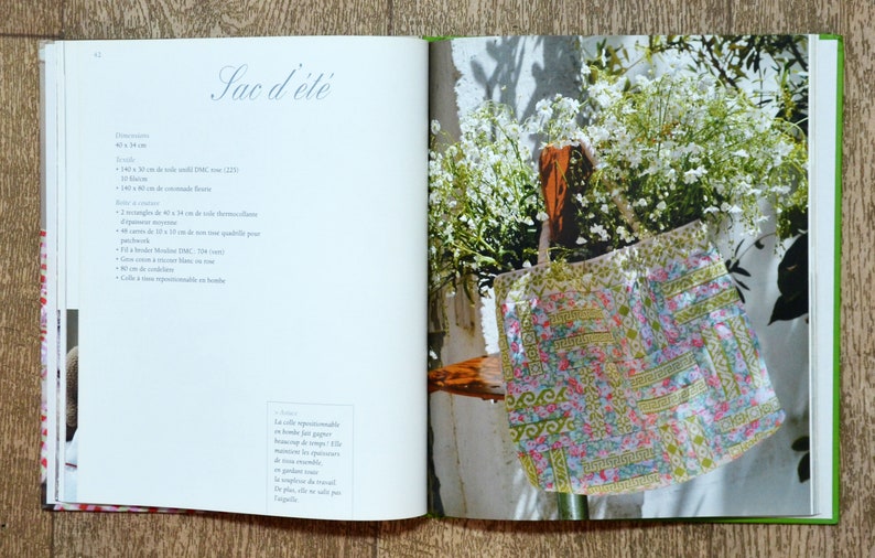 May include: A book page with the title "Sac d'&eacute;t&eacute;" and a list of materials needed to make a summer bag. The page also includes a photo of a colourful patchwork bag.