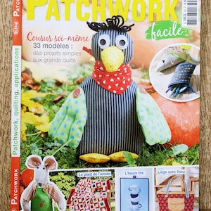 May include: A magazine cover titled "Elena Patchwork" features a stuffed bird with a red bandana and a patchwork quilt. The cover also includes text in French, with the words "Cousus soi-même" and "33 modèles".
