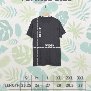 May include: A chart showing the length and width measurements in inches for a t-shirt in sizes S, M, L, XL, 2XL, and 3XL.