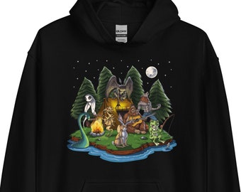 May include: Black hooded sweatshirt with a graphic print of a group of mythical creatures camping around a campfire under a starry night sky.