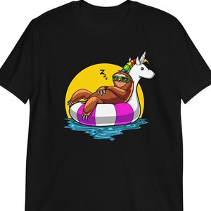 May include: A black t-shirt with a cartoon illustration of a sloth wearing sunglasses and a unicorn float in a pool. The sloth is sleeping and the text "Zzz" is above it.