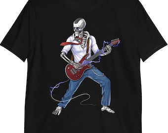 May include: A black t-shirt with a graphic of a skeleton playing a red electric guitar. The skeleton is wearing a white shirt, a red tie, and blue jeans.