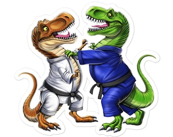 May include: A sticker featuring two cartoon Tyrannosaurus Rex dinosaurs engaged in a martial arts match. One dinosaur is brown and wearing a white gi, while the other is green and wearing a blue gi. Both have black belts.