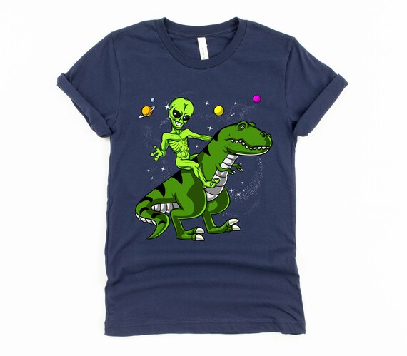 Ausserirdischer reitet T-Rex Dinosaurier aus dem Weltall Langarmshirt