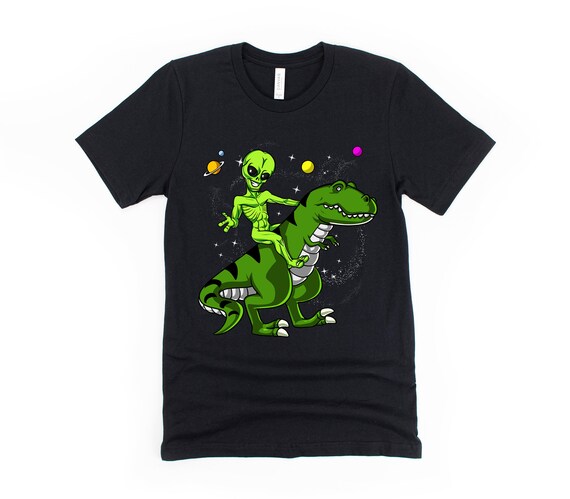 Ausserirdischer reitet T-Rex Dinosaurier aus dem Weltall Langarmshirt