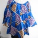 see more listings in the TOP BLOUSES section