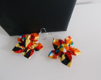 boucles d'oreilles wax