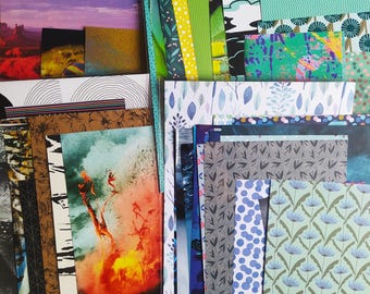 May include: A collection of patterned paper sheets in various colors and designs, including green, blue, brown, and orange. The papers feature abstract patterns, floral motifs, and geometric shapes.