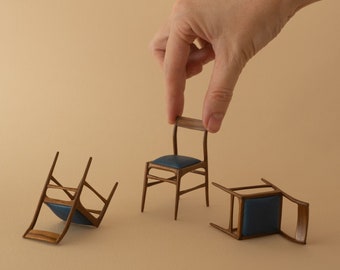 Set of 4 miniature chairs in walnut and blue or black leather. 1:12 scale for dollshouses and collectors