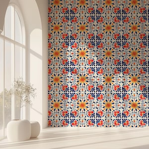 May include: Wallpaper with a repeating floral pattern in red, yellow, and blue on a cream background. The design is similar to traditional tile patterns. The wallpaper is suitable for interior decoration.