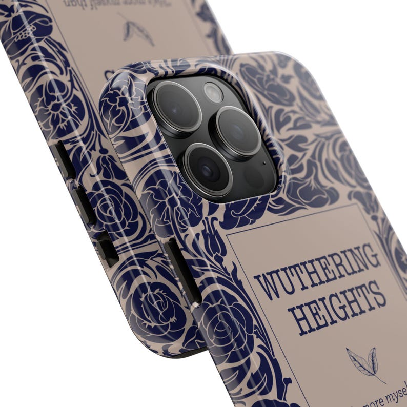 May include: A beige and blue phone case with a floral design and the text "Wuthering Heights" printed on the back.