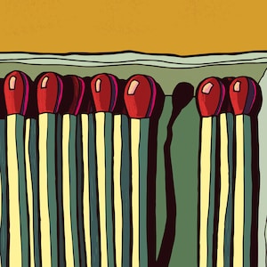 May include: A close-up of a box of red and white striped matchsticks. The matchsticks are arranged in a row and are ready to be used.