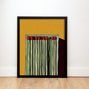 May include: A framed illustration of a box of matches with red tips on a yellow background. The matches are arranged in a vertical row and are surrounded by a black frame.