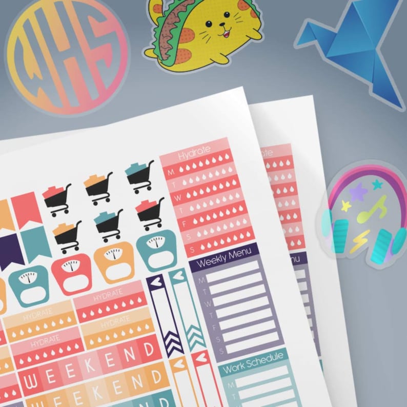 May include: A set of colorful printable planner stickers featuring various designs, including shopping carts, scales, water drops, hearts, arrows, and the words "Weekend".