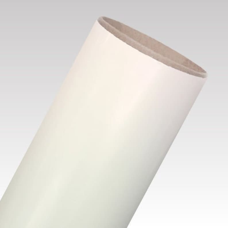 May include: A roll of white vinyl adhesive backed craft paper.