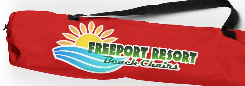 May include: Red carrying case with a black strap and a logo that says "Freeport Resort Beach Chairs" with a sun and waves graphic.
