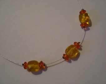 Orange and yellow pearl necklace