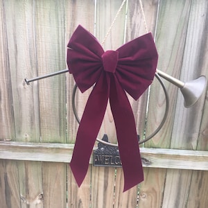 Brass Bugle Wreath with Burgundy Bow 20” x 12”