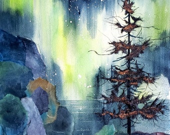 May include: A watercolor painting of a dark green pine tree silhouetted against a vibrant green, blue, and white aurora borealis. The tree is standing on a rocky shore with a dark blue body of water in the background. The artist's signature, "Sue Brown-Chepil", is in the lower right corner.
