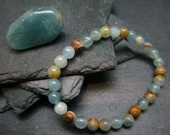 Pulsera genuina de calcita acuatina lemuriana de 7 pulgadas y cuentas redondas de 6 mm