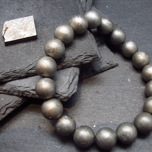Pulsera genuina de meteorito de Gibeon (7 pulgadas, cuentas redondas de 10 mm)