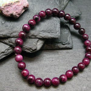 Ruby Genuine Bracelet ~ 7 Inches  ~ 6mm Round Beads
