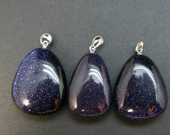 May include: Three blue gemstone pendants with silver bail settings. The gemstones are a dark blue with a sparkly, speckled texture.