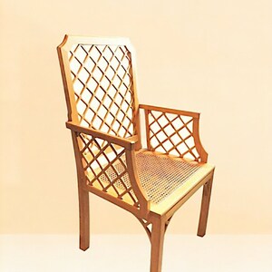 May include: A wooden chair with a lattice back and seat. The chair is made of light brown wood and has a simple, elegant design.