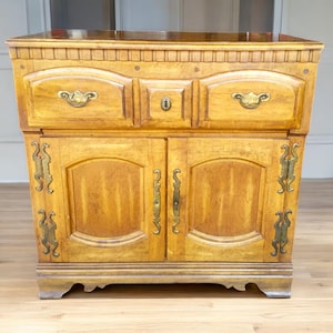 Antique oak buffet table with carved wood details Mid-century modern oak sideboard for dining room Rustic farmhouse oak sideboard storage