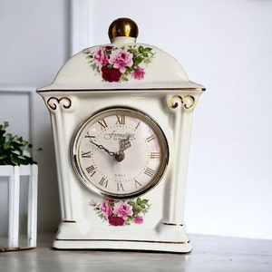 ANTIQUE-style Porcelain Clock with Floral Motif Charming  Porcelain Mantle Clock with Floral Detailing Floral Motif Porcelain Table Clock