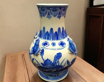VINTAGE Oriental Ginger Jar vase adding sophistication to home decor Classic ginger jar vase evoking nostalgia Blue and White color palette
