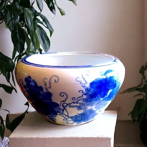 Vintage-inspired blue and white planter for Asian decor Classic lotus bowl planter evoking nostalgia with its blue and white color palette
