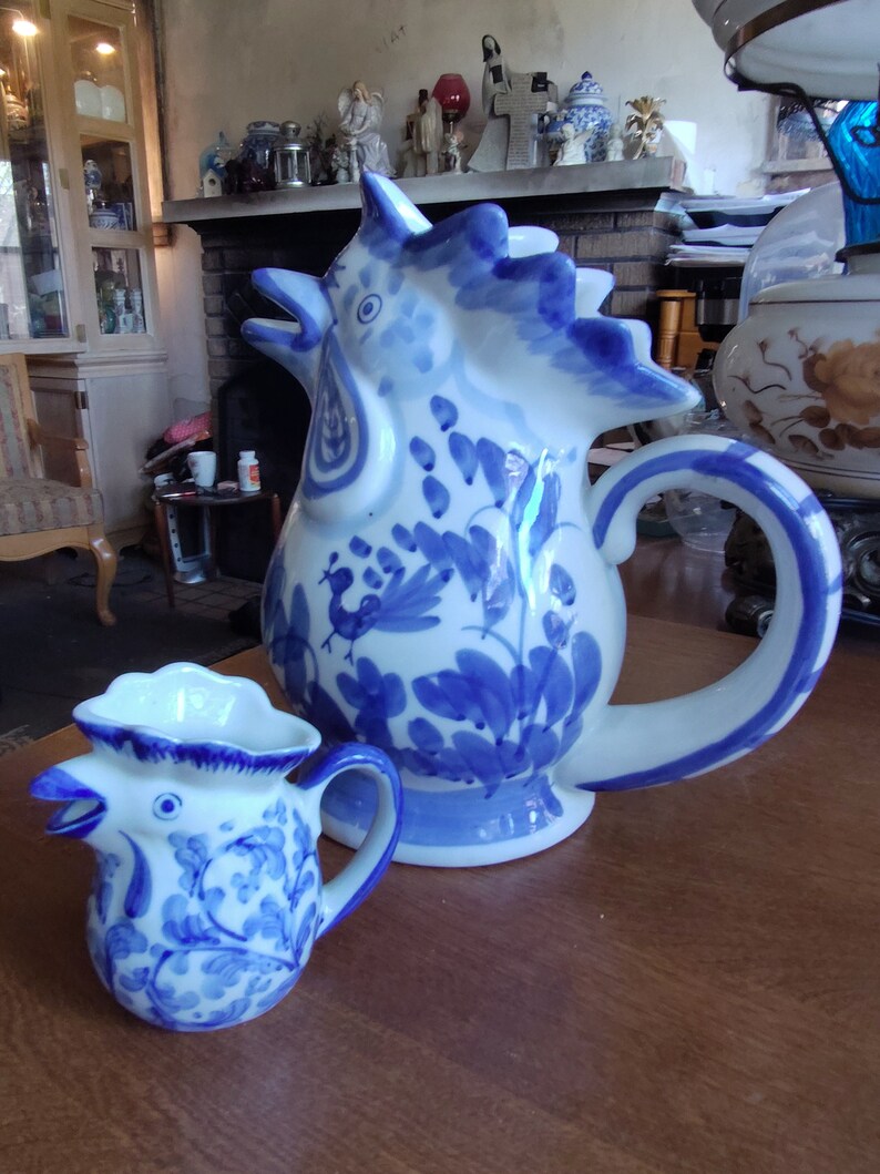 Collectible Blue White Rooster Design Pitchers.