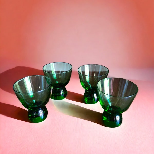 Iconic MCM green glassware collection featuring heavy bottomed cordial glasses Classic retro green cordial shot glasses with weighty bottoms
