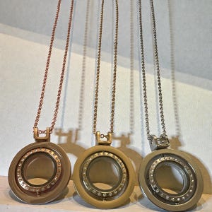 Rotating Floating Charm Locket Necklace: Rhinestone Glass Memory Keeper