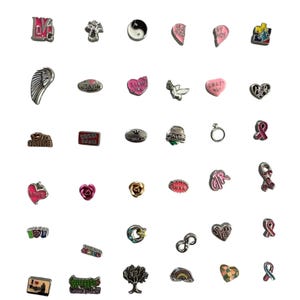 May include: A selection of silver charms with diverse designs, such as hearts, wings, crosses, and infinity symbols. Some charms display text like "Love," "Jesus," and "Sexy." Other charms have colourful accents and decorative elements.