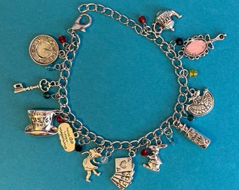 Alice in Wonderland inspired,  charm bracelet - charms and colorful beads.