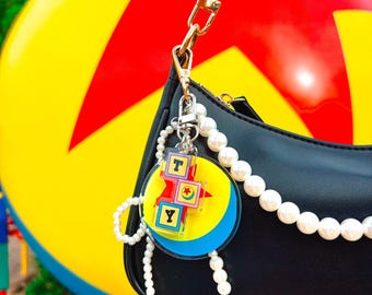 Slink’s Ball Bag Charm | Double-Sided 2-Piece Acrylic Keychain | Theme Park Inspired Accessory | Backpack, Purse, Fanny Pack, Pouchette