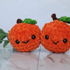 Handmade orange crochet, amigurumi stuffed toy.