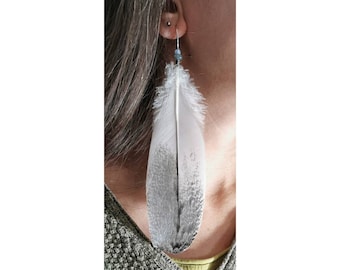 Australian Ibis feather earring. 925 sterling silver ear clip. Opaline and Moss Agath beads. Ethically sourced from molt.
