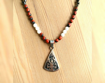 Huayraro seeds, white agate and hematite beads necklace with 925 silver Hopi Indian pendant.