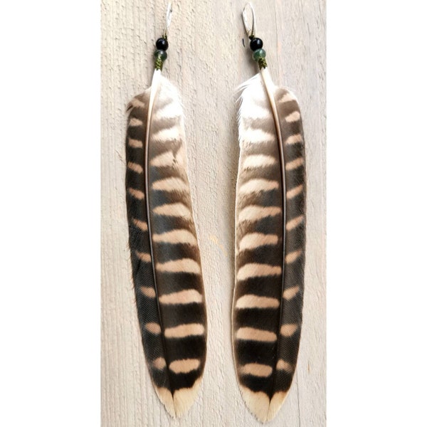 Matched pair Falcon tailfeather earrings. 925 sterling silver earhooks, gold obsidian and moss agath beads.