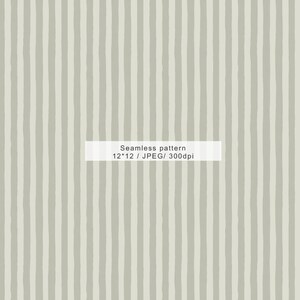 May include: Seamless pattern with vertical, unevenly spaced, light gray stripes on a pale gray background. The text "Seamless pattern 12*12 / JPEG/ 300dpi" is displayed in a white rectangle. This design is suitable for various applications.