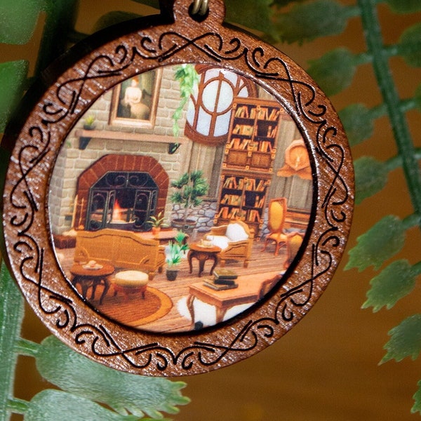 Porte-clés "Terrier Or et Noir du Blaireau" - Un bel accessoire en bois vous montrant l'intérieur d'une salle commune magique et chaleureuse