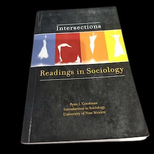 May include: A sociology textbook titled "Intersections: Readings in Sociology." The cover features a colorful design with abstract figures. The author is Ryan J. Goodman, and the book is from the University of New Mexico.