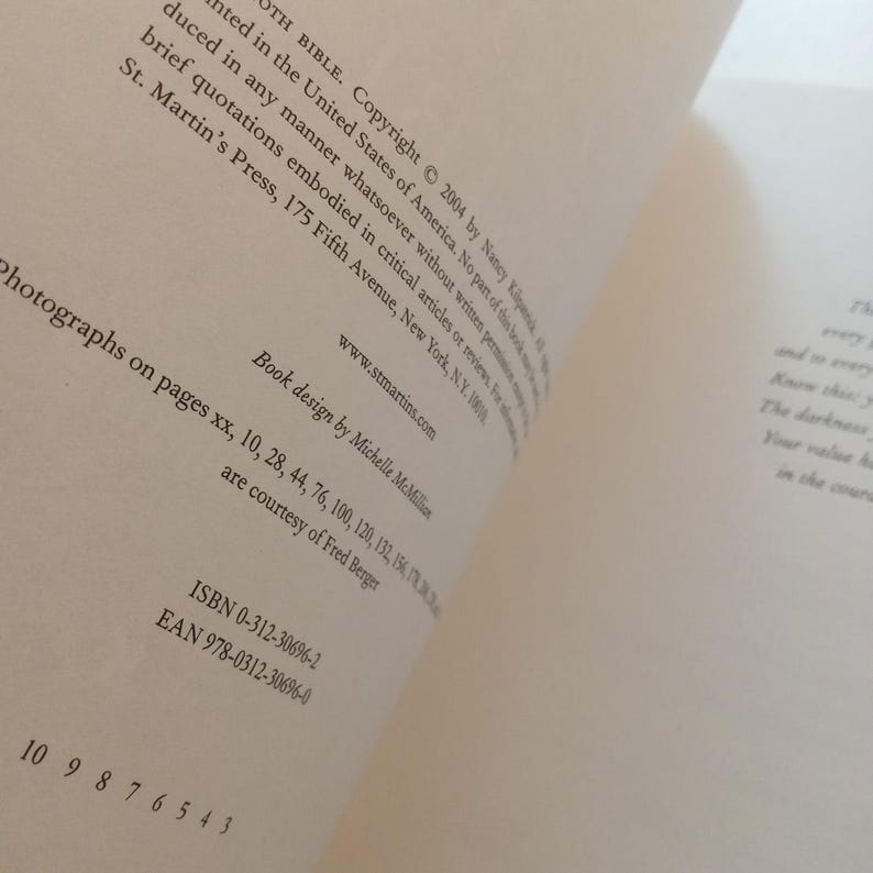 May include: A white ceramic mug with a black handle and the text "But First, Coffee" in a black, bold font. The mug is on a white surface. The mug is approximately 4 inches tall.